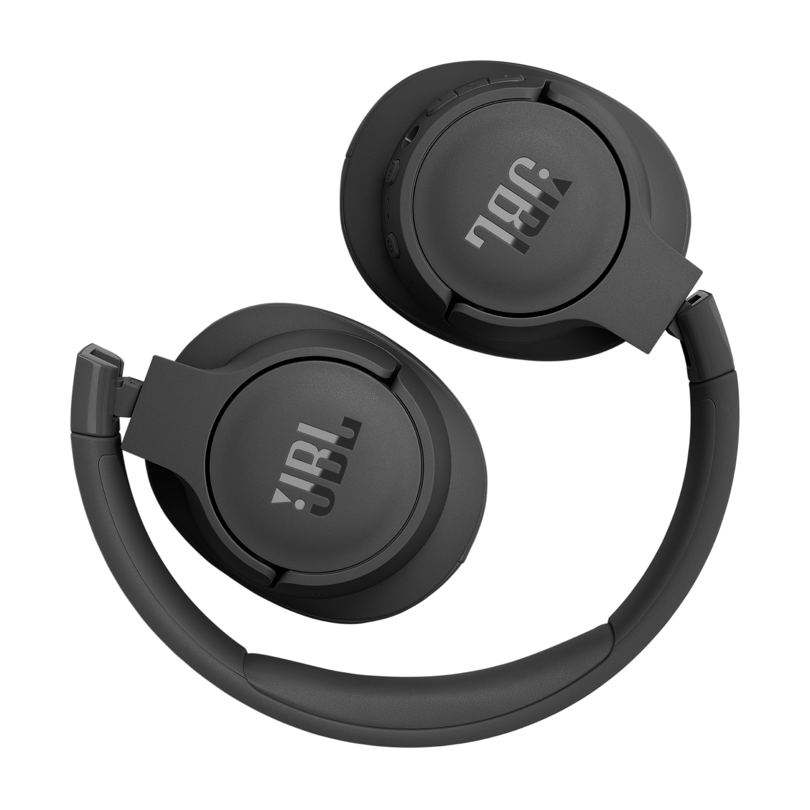 Toma cenital de auriculares JBL gris oscuro sobre una superficie gris claro. Los auriculares están abiertos, mostrando las orejeras y la diadema.