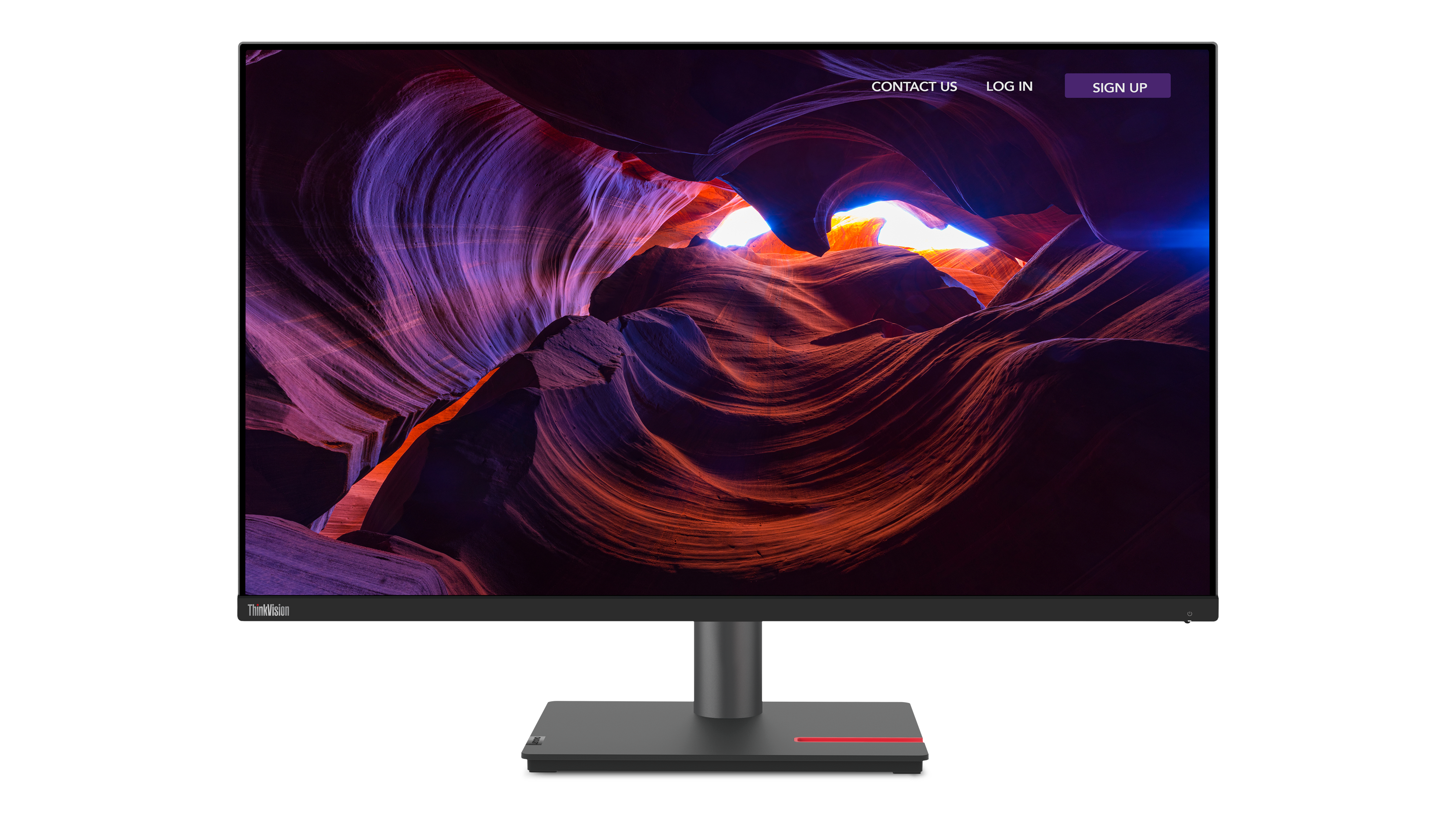 Ein Computermonitor zeigt eine abstrakte Landschaft aus roten und violetten Felsformationen. Der Monitor steht auf schwarzem Hintergrund.