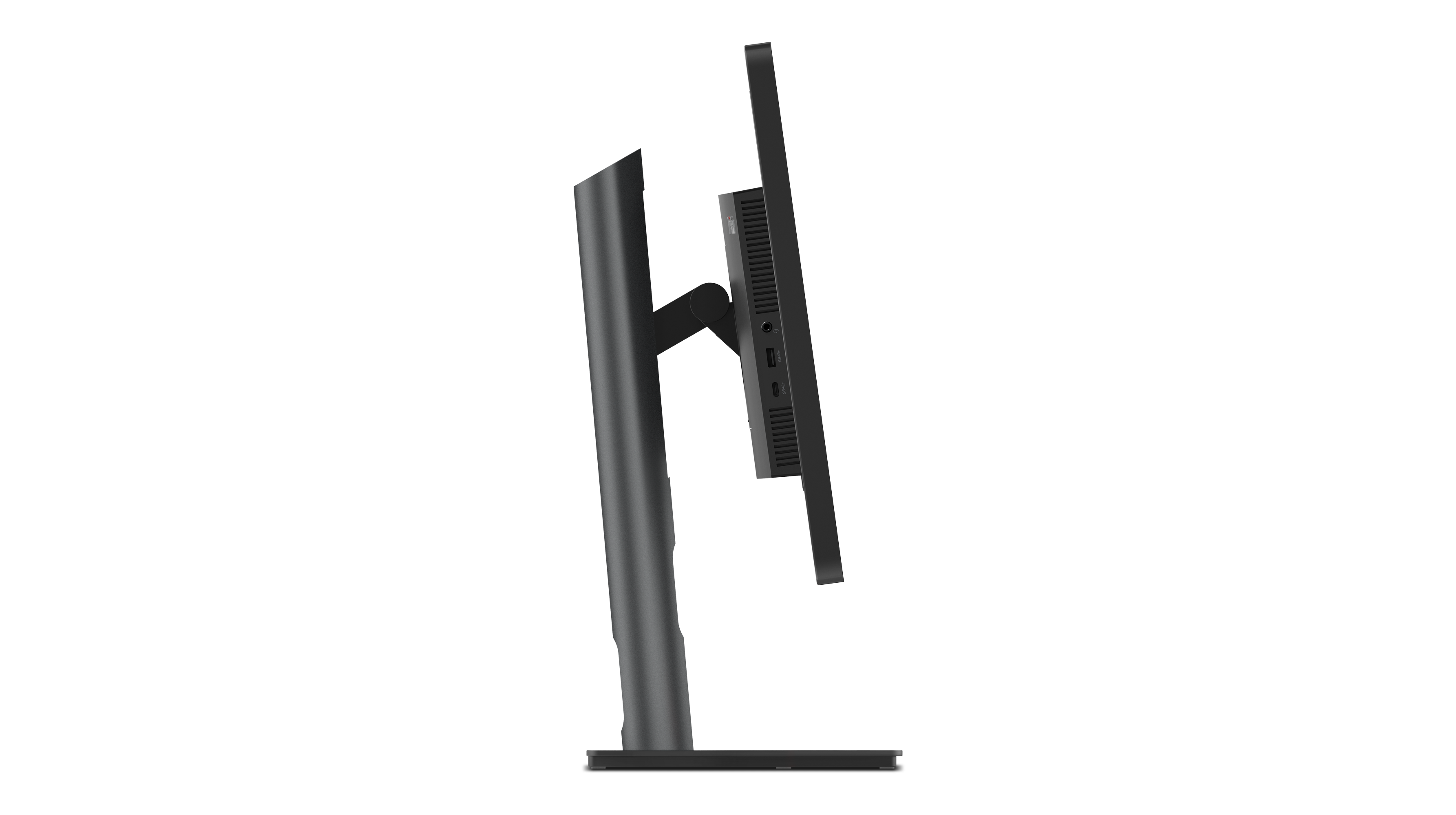 Seitenansicht eines schwarzen Computermonitors auf schwarzem Hintergrund. Der Monitor ist leicht abgewinkelt und zeigt Anschlüsse.