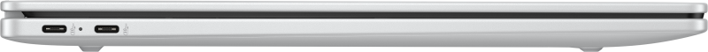 Seitenansicht eines silbernen Laptops. Zwei USB-C-Anschlüsse und eine kleine LED-Anzeige sind sichtbar.