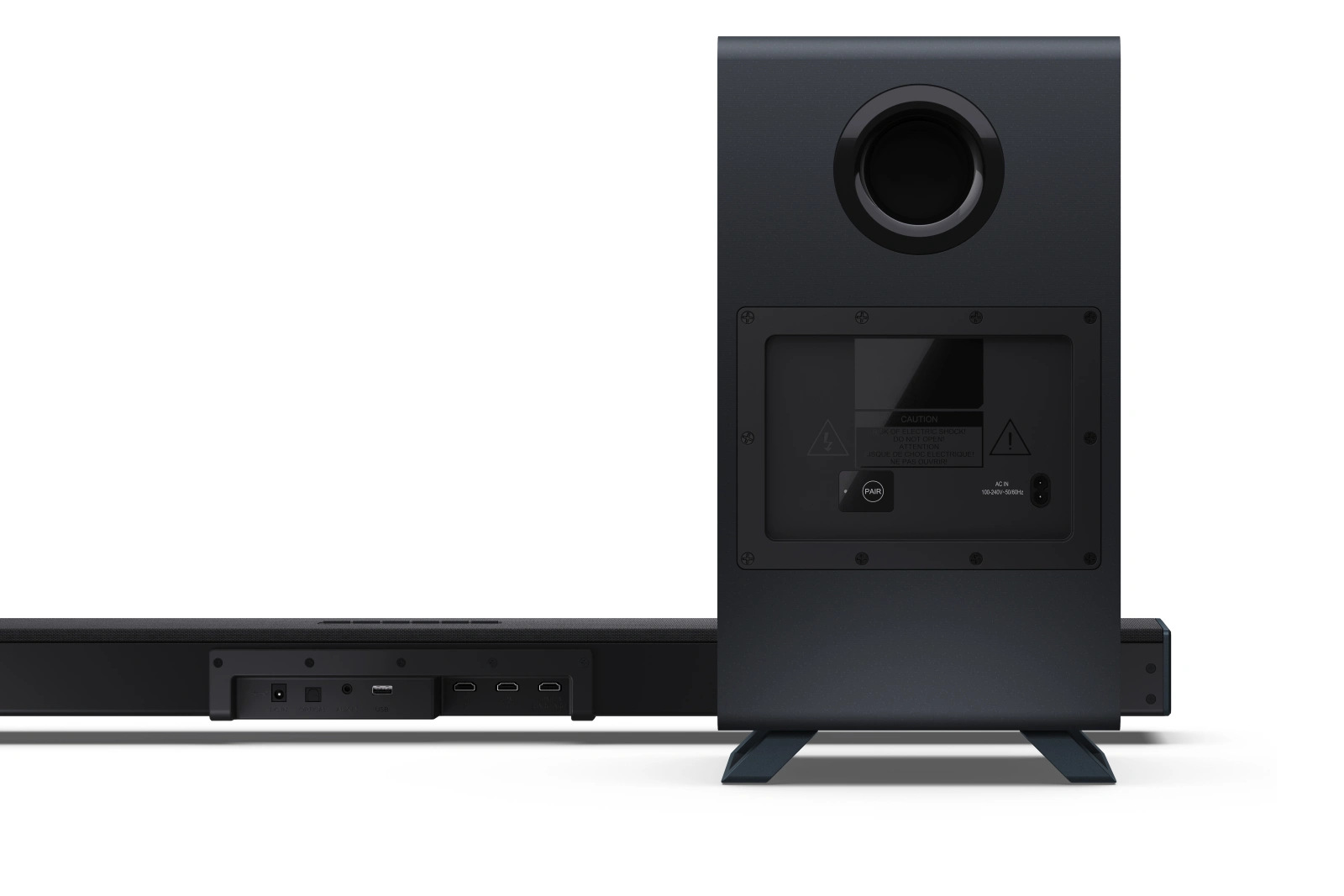 Czarny soundbar i subwoofer na białym tle. Subwoofer ma duży okrągły port i tylny panel z ostrzeżeniami.