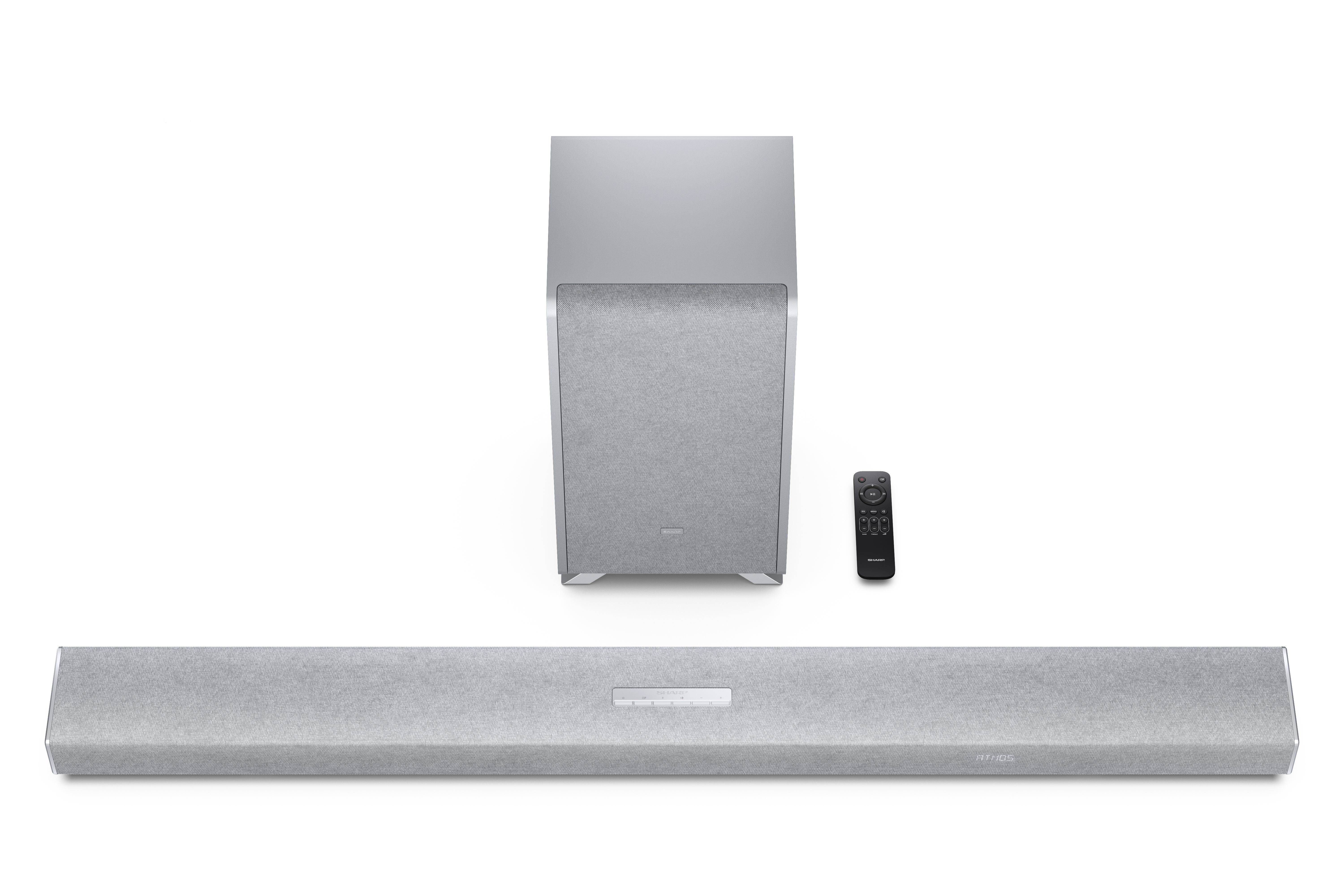 Jasnoszary soundbar, subwoofer i pilot na białym tle. 'ATMOS' jest widoczne na soundbarze.