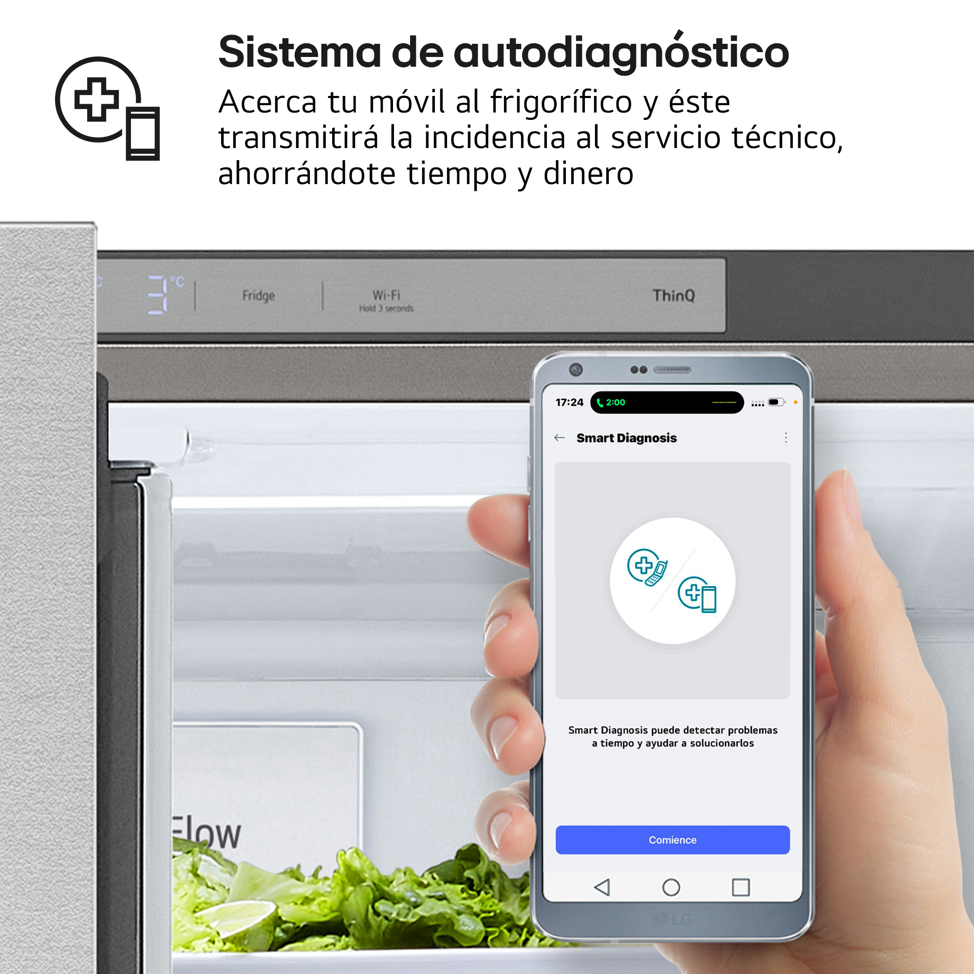 Una mano sostiene un teléfono cerca de una nevera. El teléfono muestra una aplicación de diagnóstico.