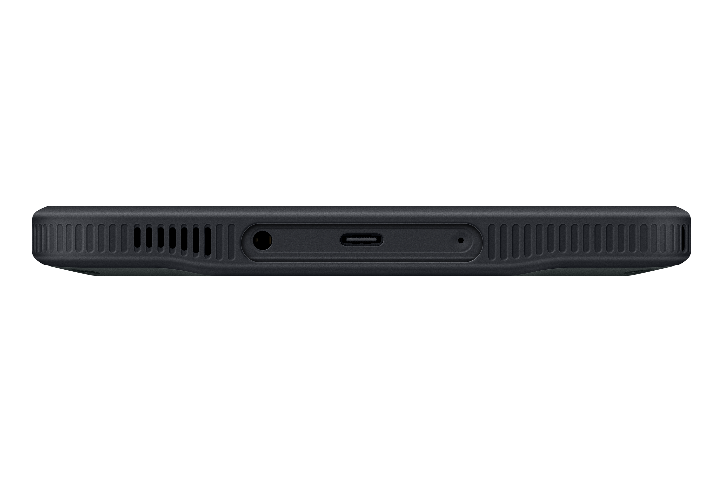 Primer plano del borde inferior de un teléfono gris oscuro. Tiene un altavoz, puerto y conector para auriculares sobre un fondo negro.