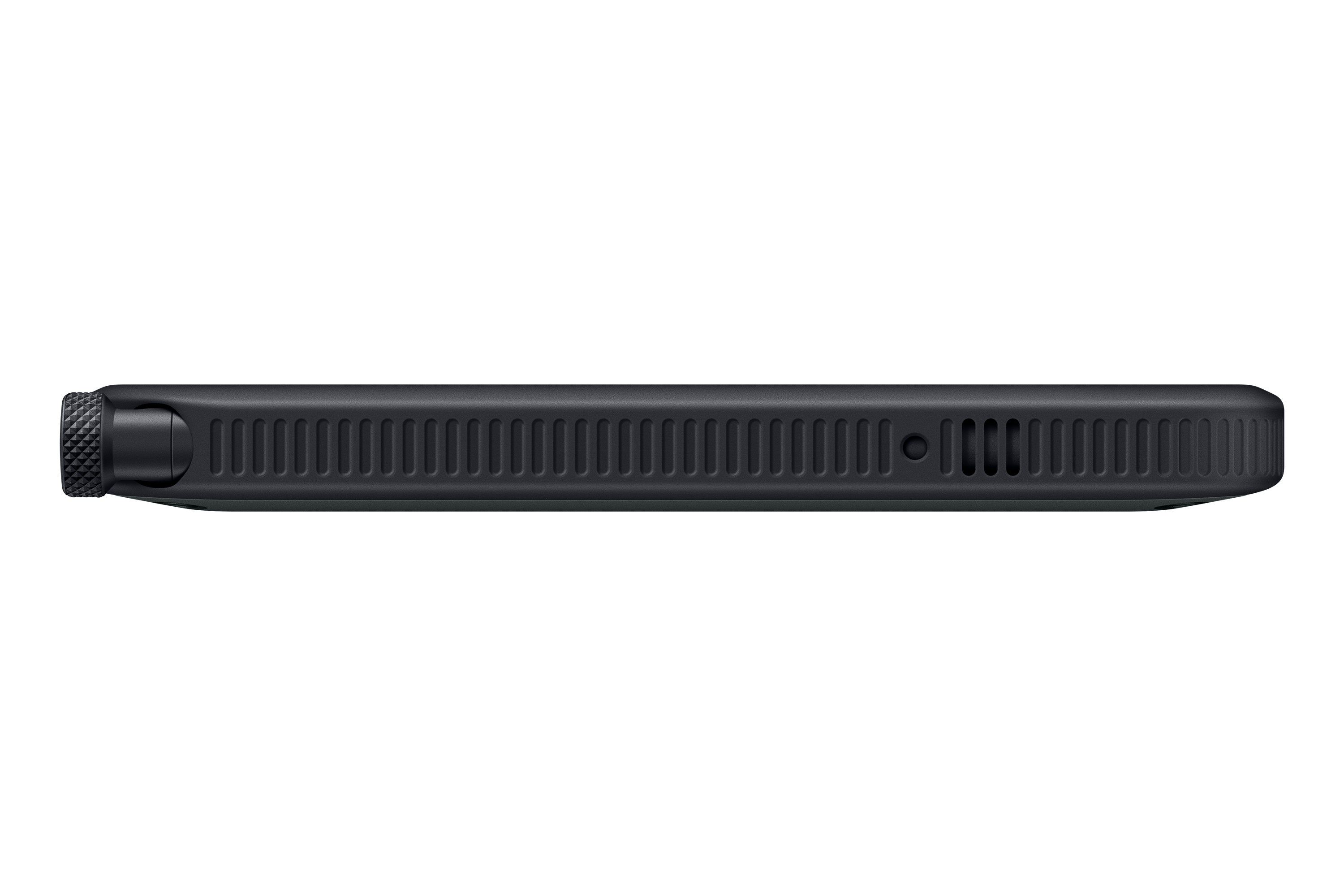 Un dispositivo negro y rectangular se ve de lado contra un fondo negro. Tiene una superficie acanalada.