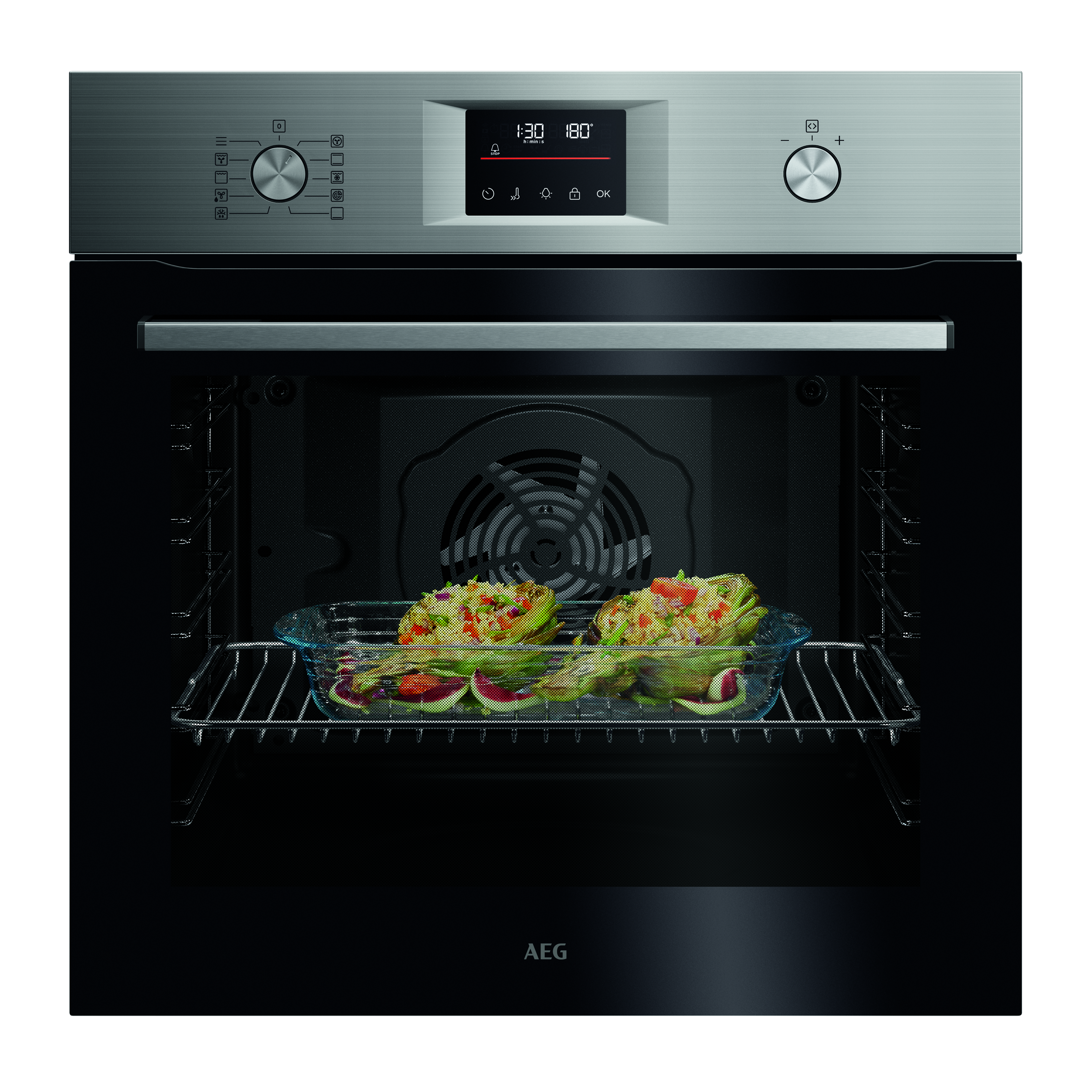 Ein Backofen mit Essen darin. Der Ofen ist aus Edelstahl, mit digitaler Anzeige für Zeit und Temperatur. Das Essen befindet sich in einer Glasschale.
