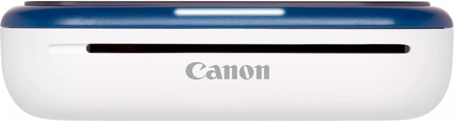 Biała drukarka Canon z niebieskim wierzchem. Ma czarną szczelinę wyjściową. Widoczne jest logo Canon.