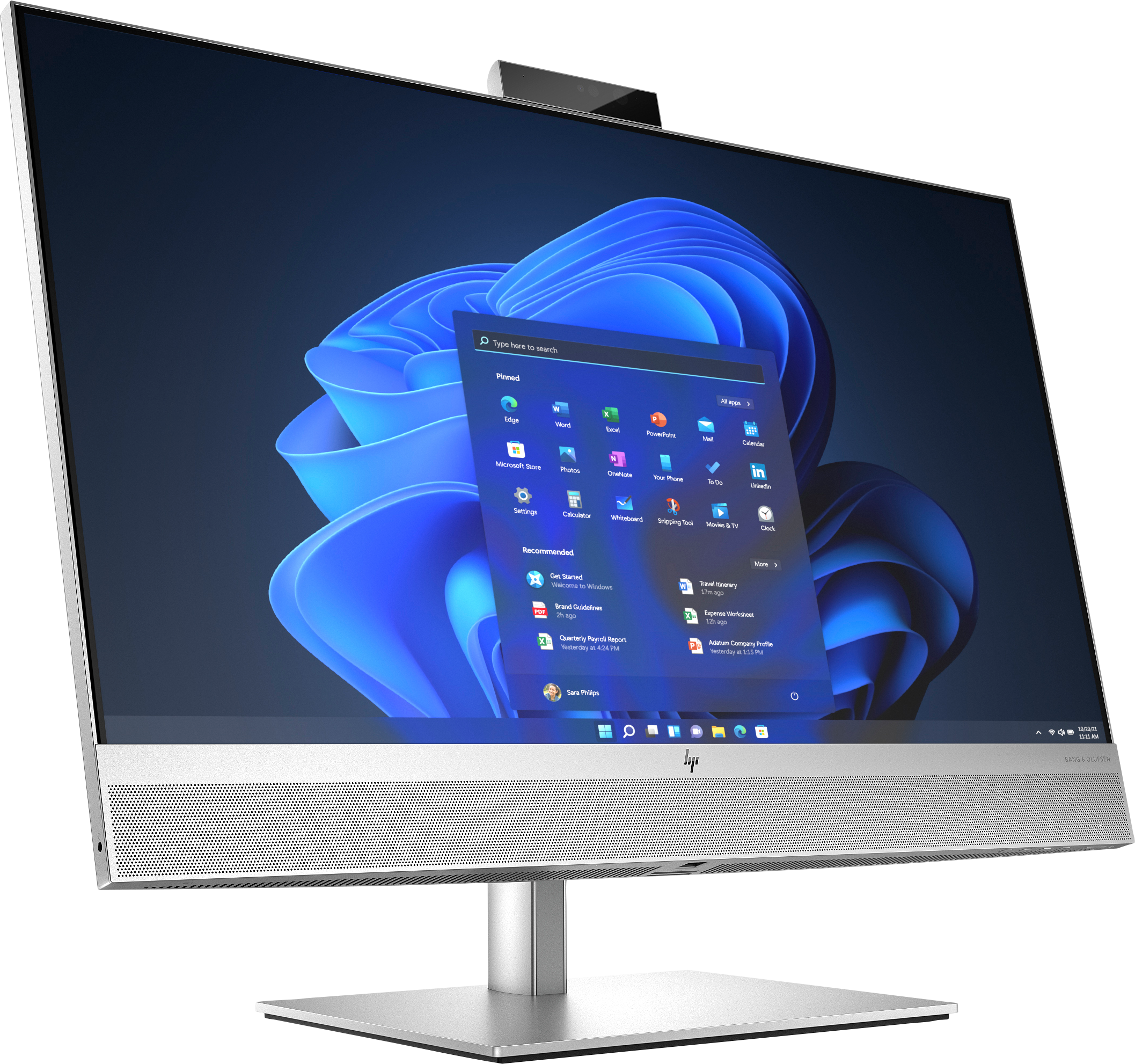 Ein HP-All-in-One-Computer zeigt eine Windows 11-Oberfläche. Der Bildschirm zeigt App-Symbole und eine Suchleiste.