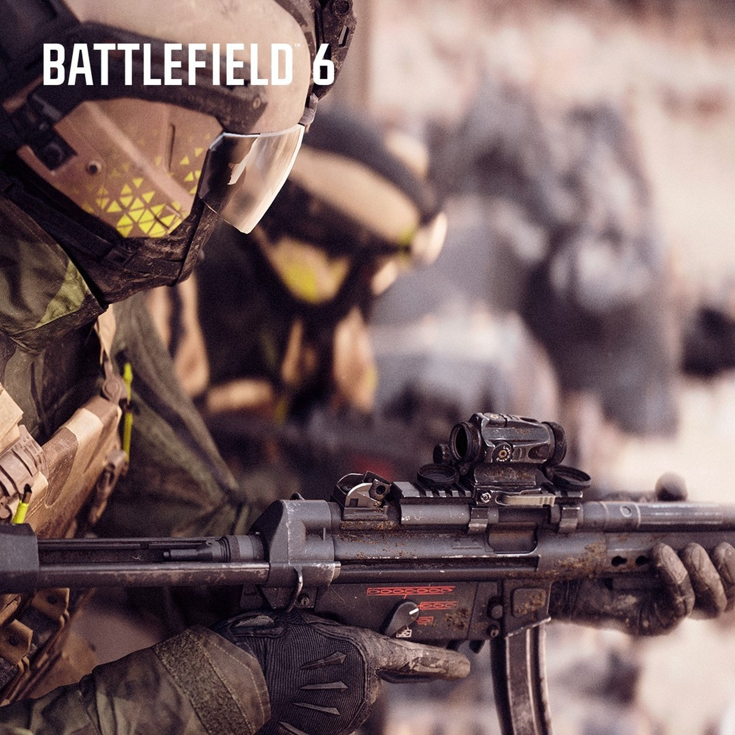 Soldato che mira con un'arma, parte del gioco Battlefield 6. Il soldato indossa un elmetto e dei guanti. L'arma ha un mirino.