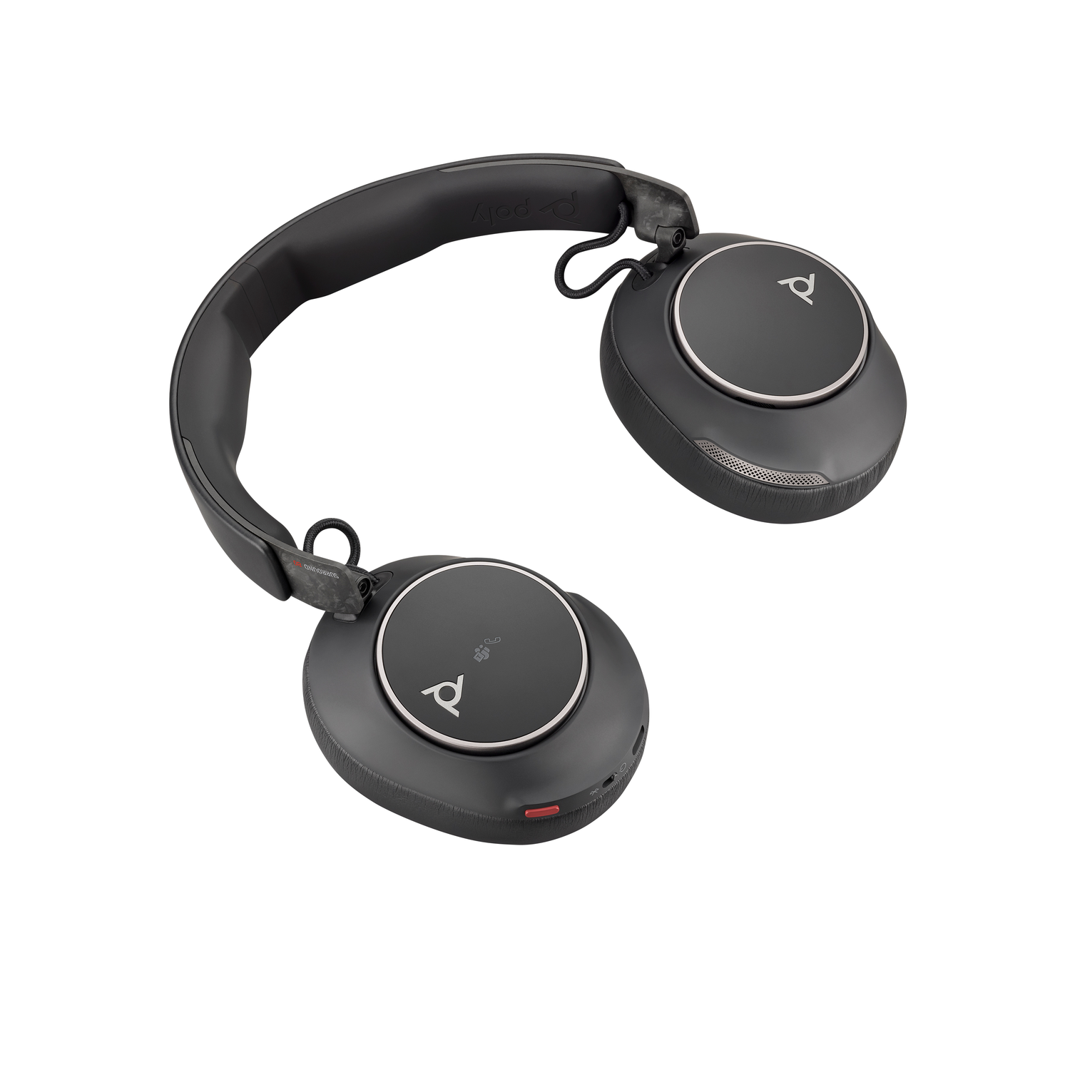 Black Poly headphones on a white background. The headphones have a padded headband and ear cups with silver accents.