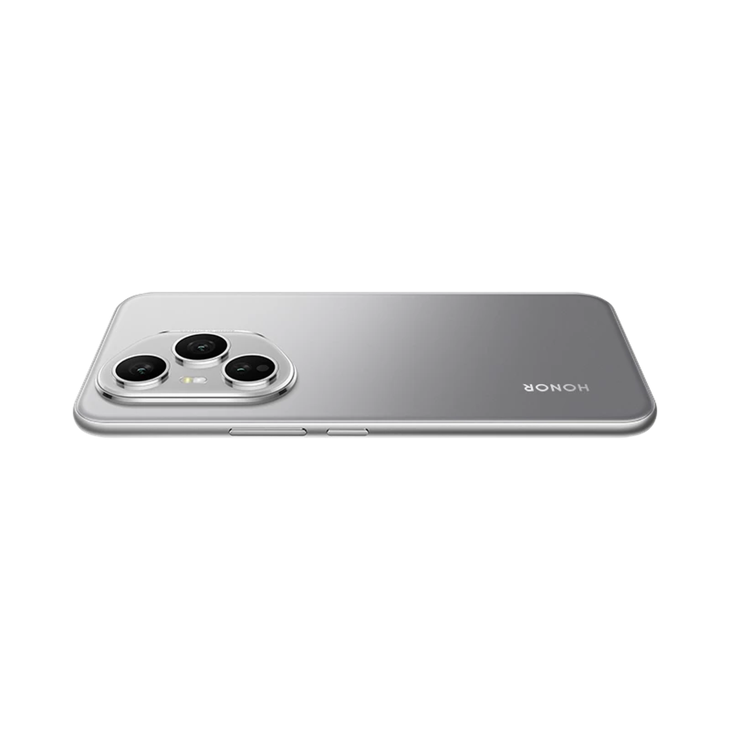 Silver Honor phone back, three camera lenses, black background, HONOR logo. Phone is horizontal and slightly angled.