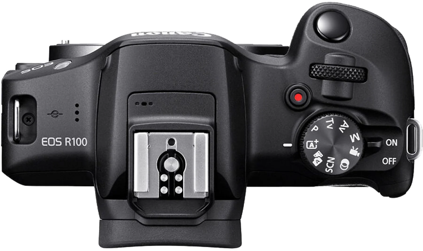 A Canon EOS R100 kamera felülnézete. Gombokat, tárcsákat és vakupapucsot mutat. Fekete test ezüst részletekkel.