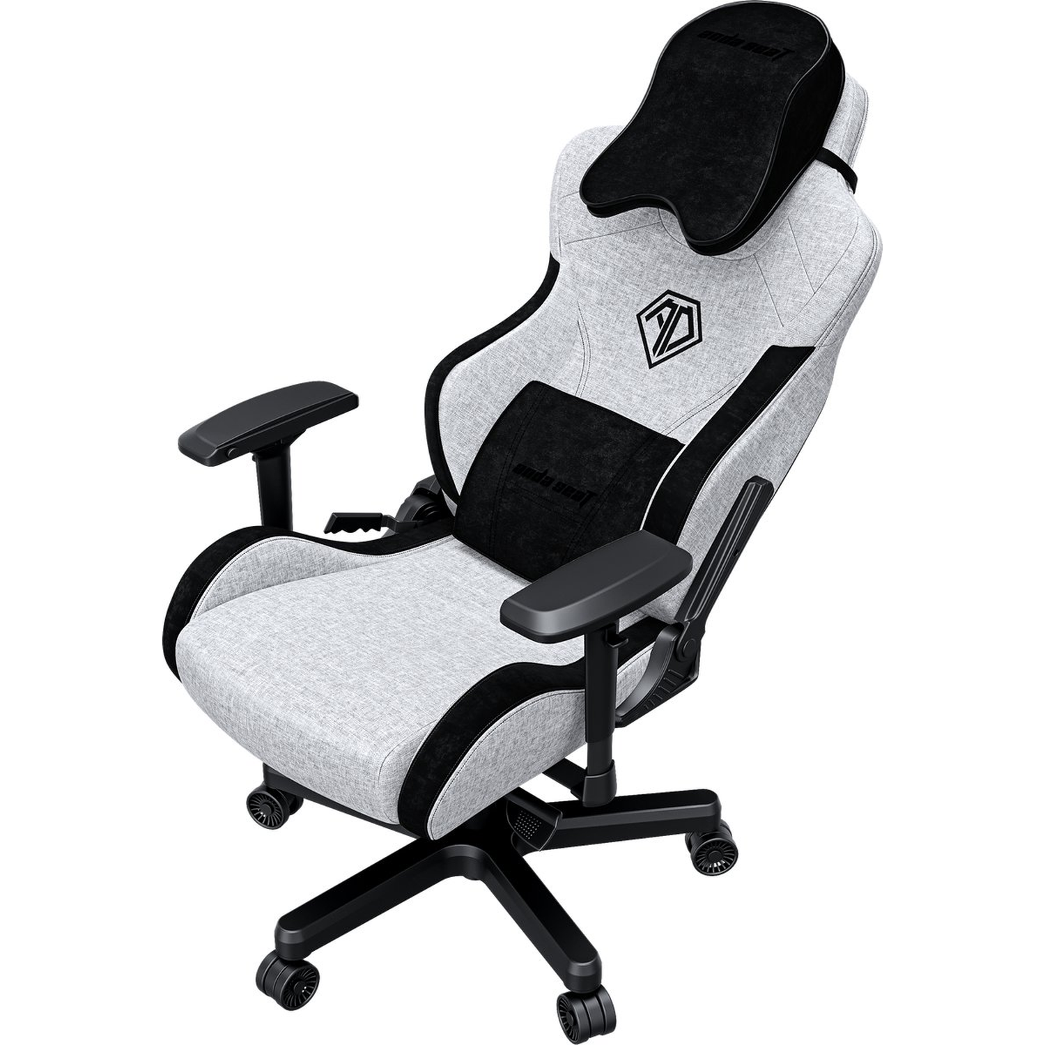 A gaming chair. Grey and black, with a headrest and lumbar support. Features armrests and a five-wheel base.
