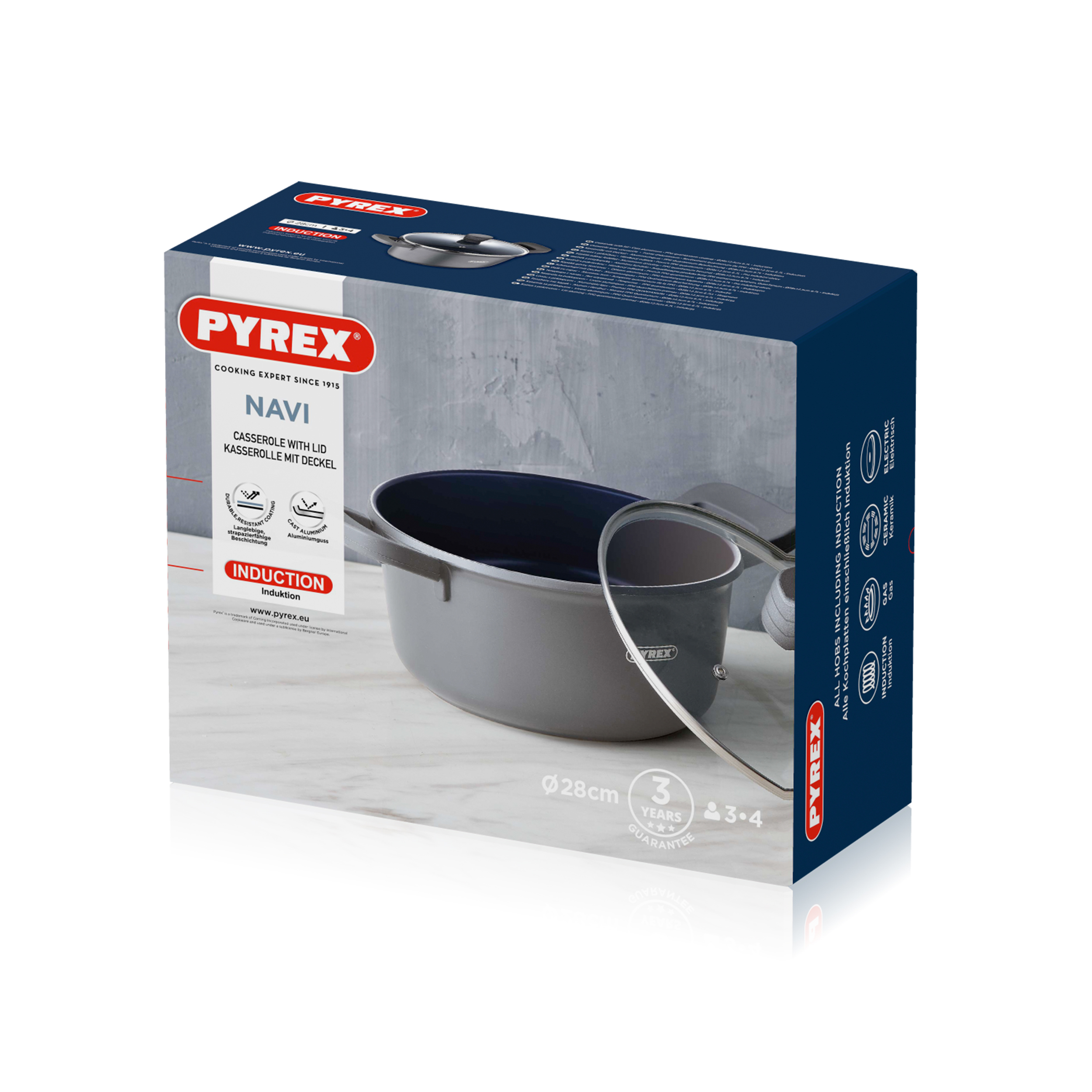 Egy Pyrex fazék fedővel egy dobozon. A fazék szürke, üvegfedővel. A dobozon a Pyrex logó és szöveg látható.