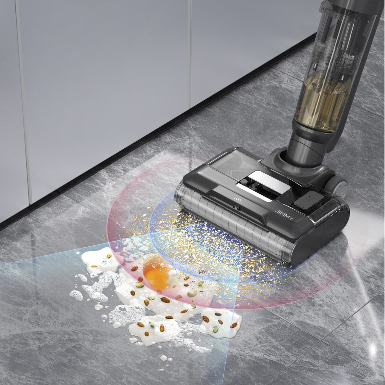 Odkurzacz JIMMY czyści szarą podłogę z płytek. Widoczna jest piana i zanieczyszczenia. Pokazano kolorowe ścieżki czyszczenia.