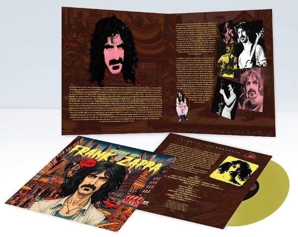 Frank Zappa album borítója az arcával, és egy bakelit lemez, sárga vinil, fehér felületen.