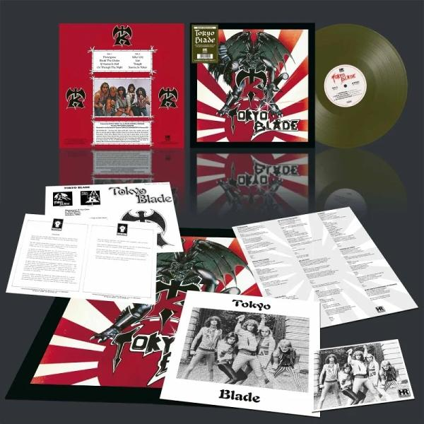 Album borító démon grafikával, zöld bakelit lemez és betétekkel. Piros háttér zenekari fotókkal és dalszövegekkel. Tartalmazza a logót.
