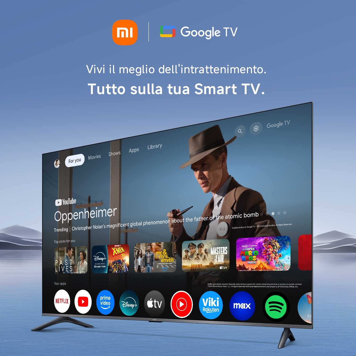 Uno schermo TV mostra l'interfaccia di Google TV. Sono visibili programmi come Oppenheimer e app come Netflix.