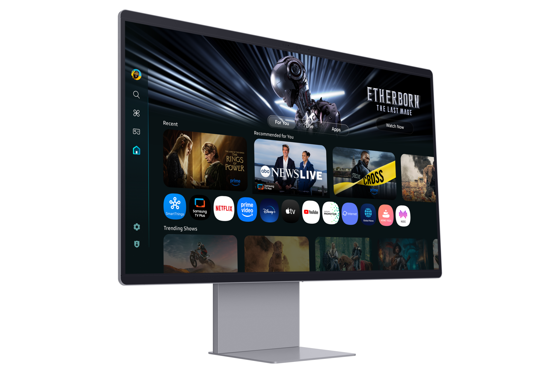 Ein moderner Fernseher, der eine Streaming-Oberfläche anzeigt. Zu den Shows gehören 'The Rings of Power', 'News Live' und 'Etherborn'. Der Fernseher steht auf einem silbernen Ständer.
