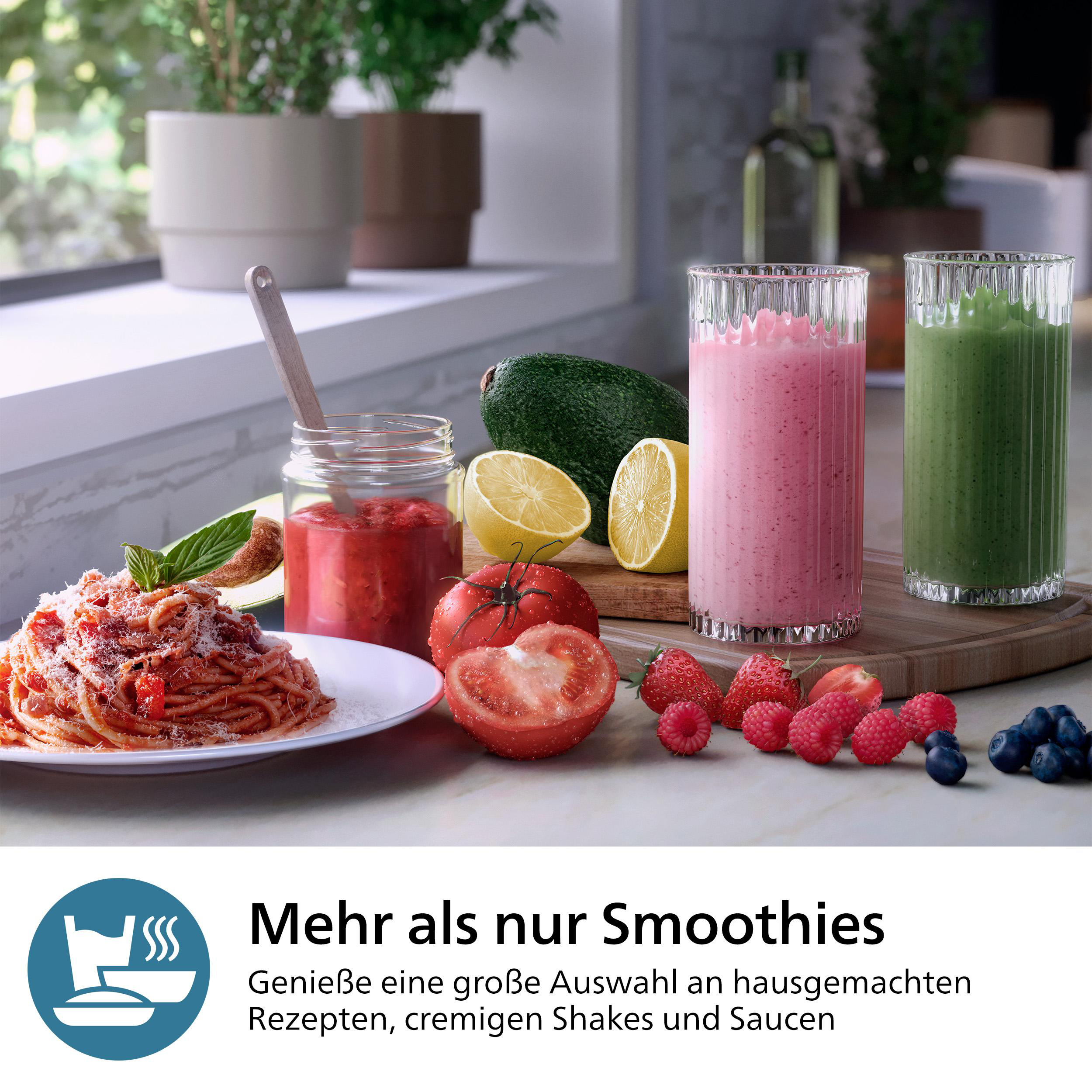 Ein Tisch mit Spaghetti, Smoothies, Obst und Gemüse. Enthält Tomaten, Avocado, Zitronen, Himbeeren und Blaubeeren.