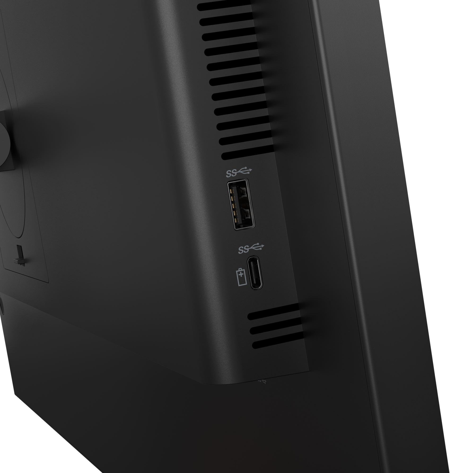 Nahaufnahme eines schwarzen Monitors. USB-Anschlüsse, Lüftungsschlitze und die Seite des Bildschirms sind sichtbar. Schwarzer Hintergrund.