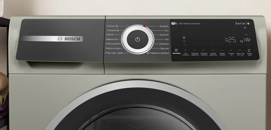 Zbliżenie na srebrny panel sterowania suszarki Bosch z pokrętłem i wyświetlaczem cyfrowym pokazującym czas i ustawienia.