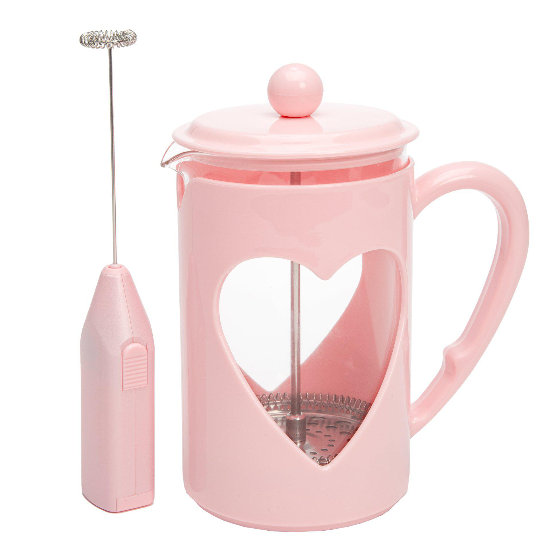 Rosa French Press mit herzförmigem Ausschnitt und rosa Milchaufschäumer auf weißem Hintergrund.