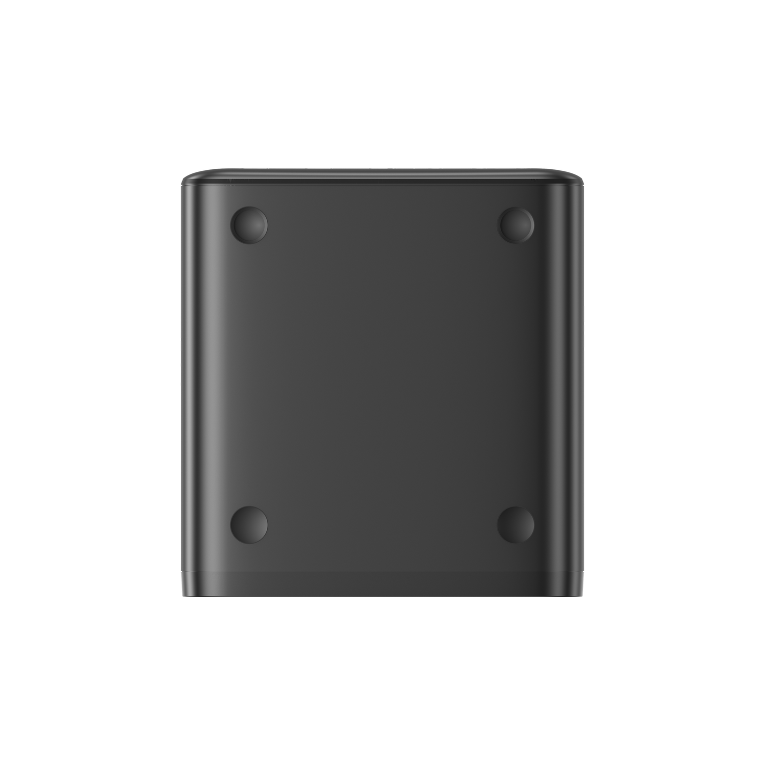Un appareil carré noir, vu d'en bas, avec quatre pieds ronds et gris. L'appareil a des bords arrondis. Fond blanc.