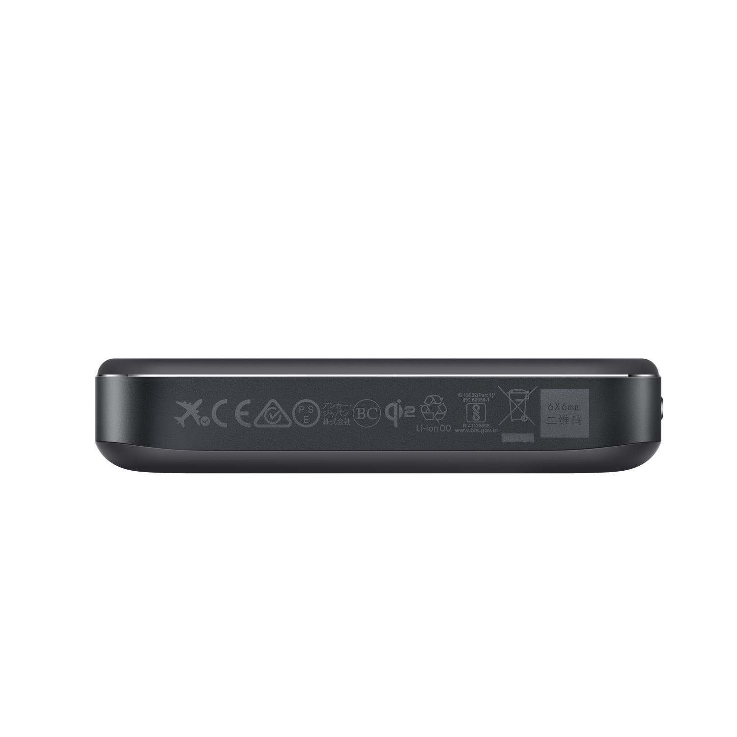 A dark gray electronic device with regulatory symbols and text in multiple languages.