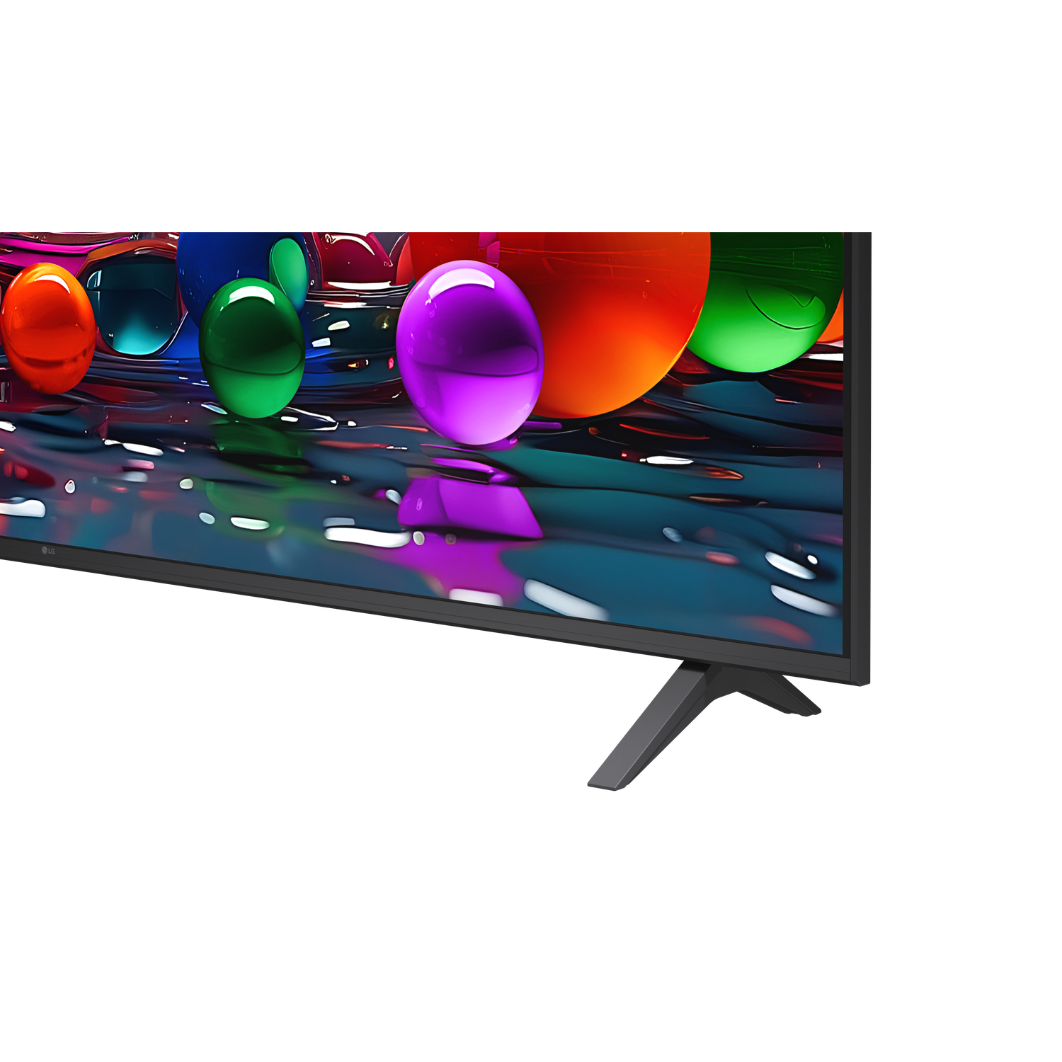 A TV shows colorful spheres. The TV is black, with a stand. Spheres: red, green, blue, purple, orange. Black background.