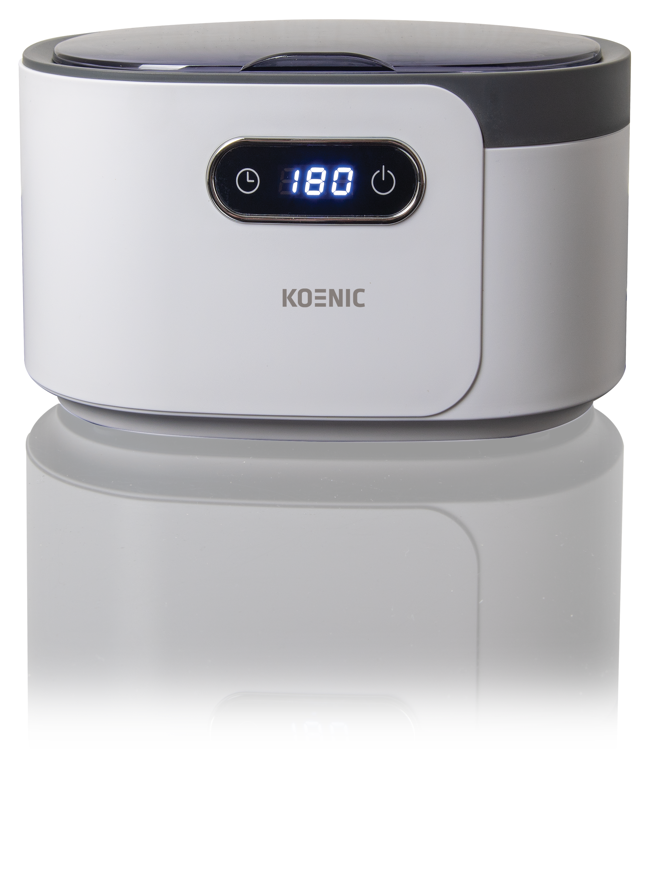 Biało-szara ultradźwiękowa myjka Koenic. Ma cyfrowy wyświetlacz pokazujący 180. Dolna część jest odbita.