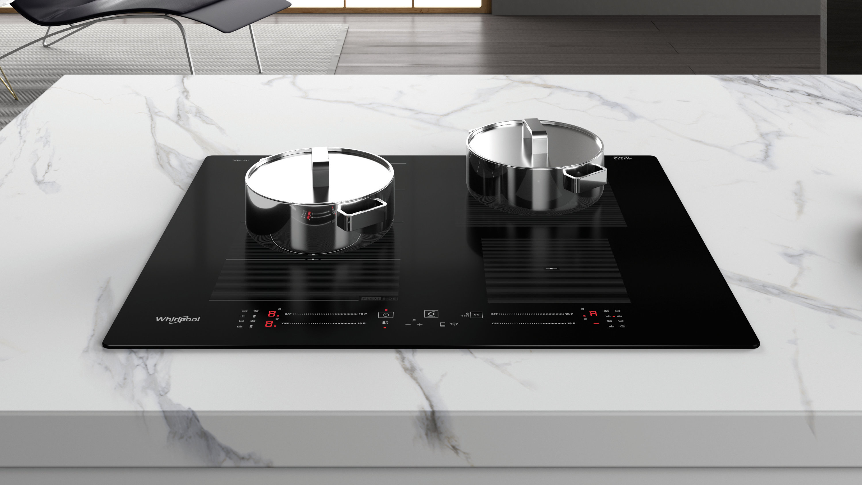 Czarna płyta indukcyjna z dwoma garnkami ze stali nierdzewnej. Na białym marmurowym blacie. Krzesło w tle.