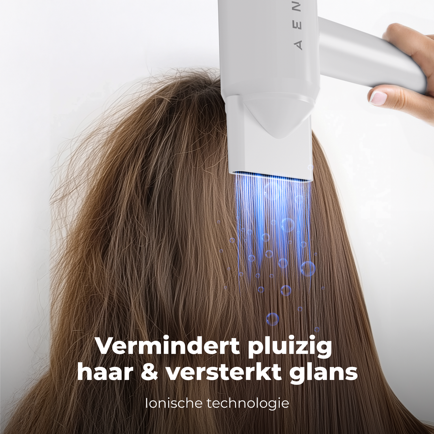 A person's brown hair is being treated with a white device that emits blue light. Text says 'Reduces frizzy hair & enhances shine'.