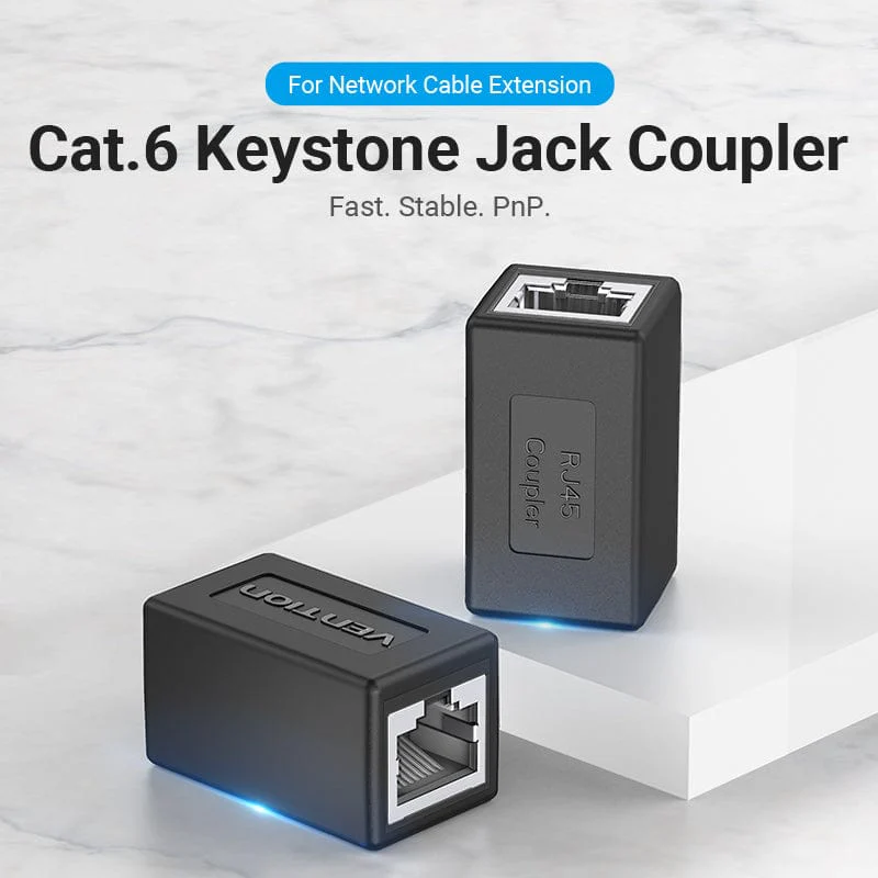 Két fekete Cat.6 Keystone Jack csatoló RJ45 portokkal, fehér felületen. A szöveg szerint: 'For Network Cable Extension'.