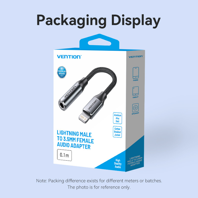 Egy Lightning-3,5 mm-es audioadapter csomagolásának kijelzője. Fekete és ezüst színű, a Vention márkával a dobozon és az adapteren.