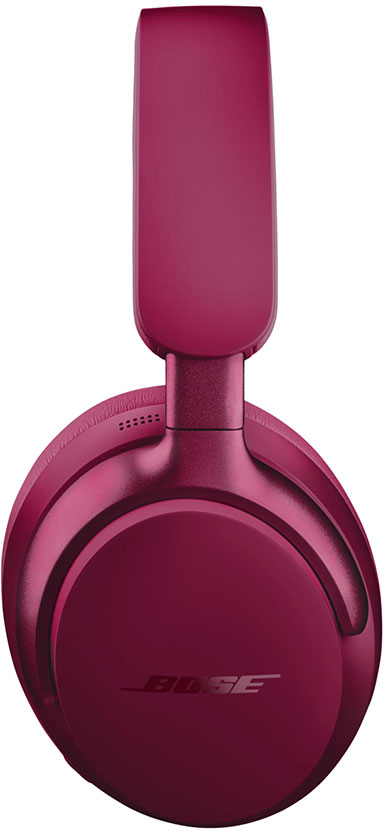 Ein Paar bordeauxfarbene Bose-Kopfhörer. Das Kopfband ist ausgezogen und die Ohrmuscheln sind kreisförmig, mit dem Bose-Logo.