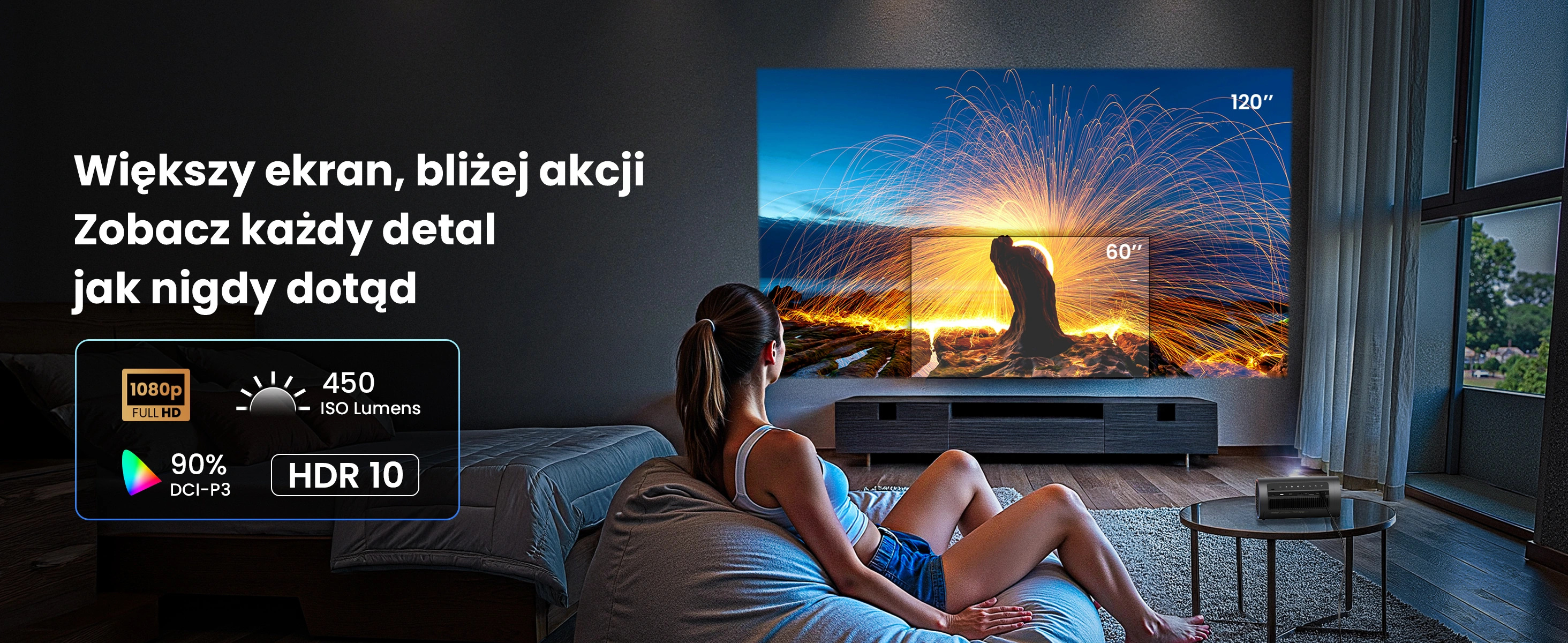 Kobieta ogląda telewizję z fajerwerkami. Tekst: Większy ekran, bliżej akcji. Cechy: 1080p, 90% DCI-P3 i HDR 10.