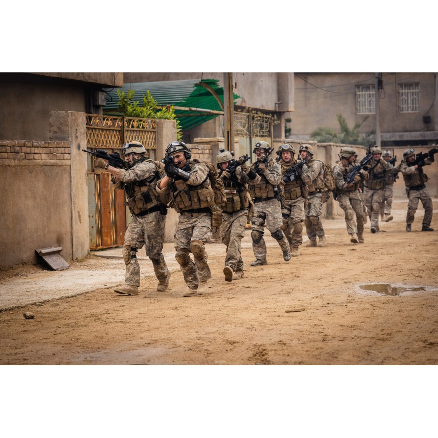 A group of soldiers in camouflage gear march down a dirt road, holding rifles. Buildings line the road.