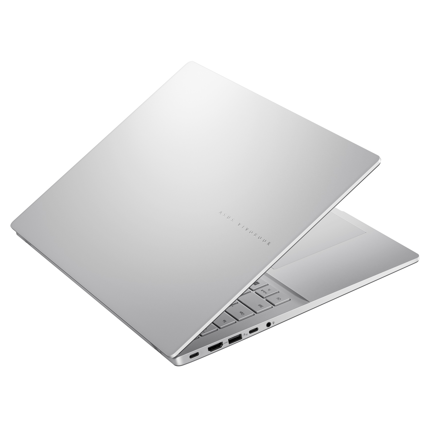 A silver laptop, slightly open, against a white background. The brand name 'ASUS Vivobook' is visible. The keyboard and ports are shown.