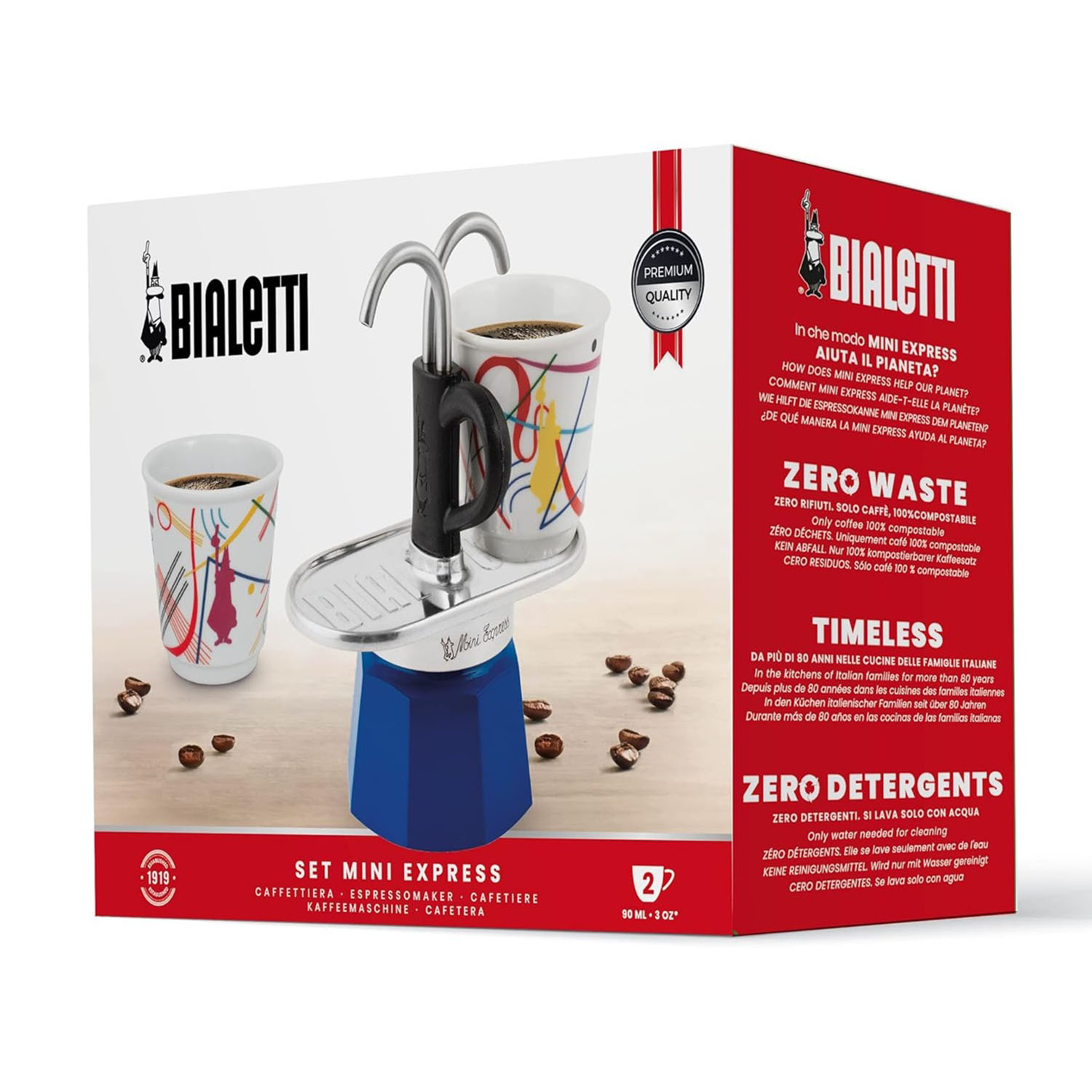 Un set Bialetti Mini Express. Include una caffettiera espresso blu, due tazze e una scatola con informazioni sul prodotto.