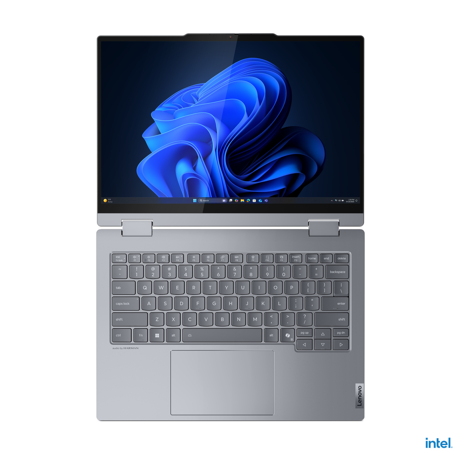 Een Lenovo laptop met zilveren toetsenbord en een scherm met een blauwe abstracte afbeelding, tegen een zwarte achtergrond.