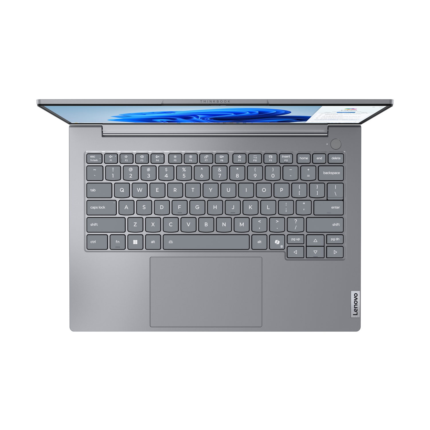 Top view of a gray Lenovo ThinkBook laptop. The keyboard is in focus, with the screen slightly open and displaying a blue background.