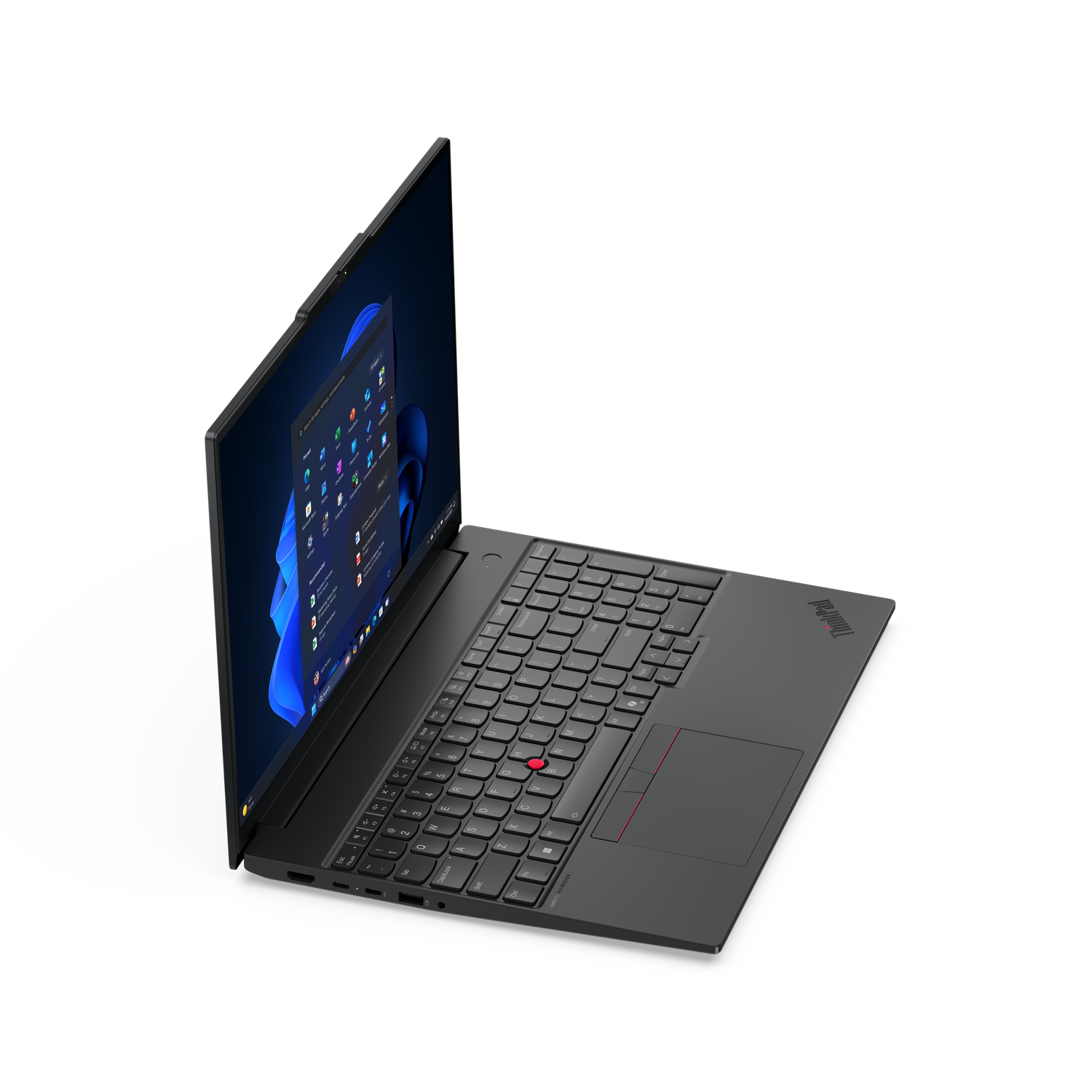 Un ordinateur portable ThinkPad noir est ouvert, affichant l'interface Windows 11 sur son écran. Clavier visible, trackpoint rouge, fond noir.