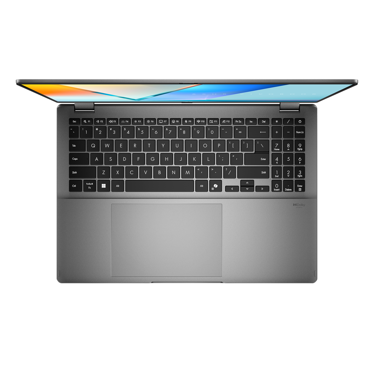 A silver laptop is open on a black background. The screen displays a colorful abstract design, and the keyboard is visible.