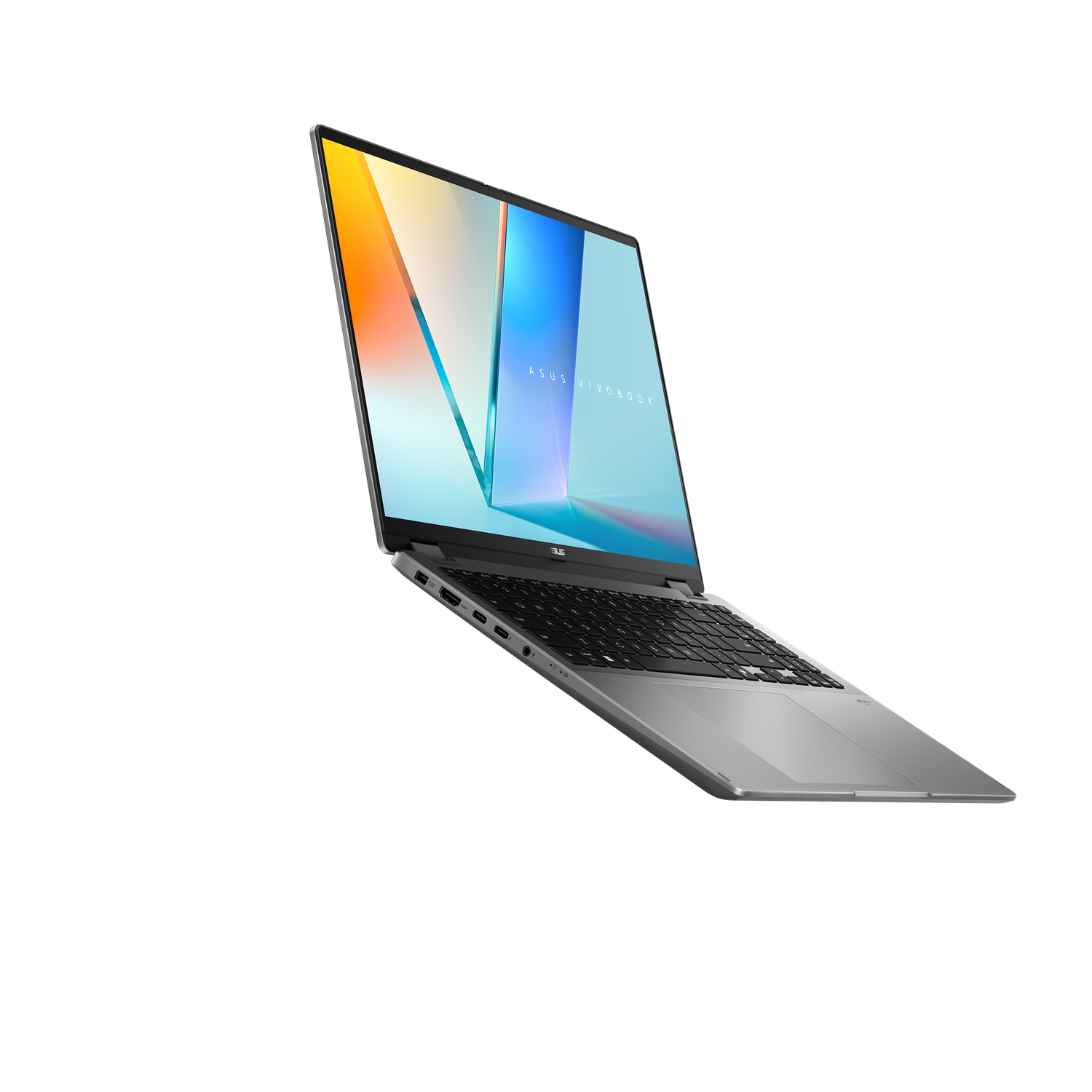 A silver ASUS Vivobook laptop is angled on a black background. The screen displays a colorful gradient. The keyboard is black.