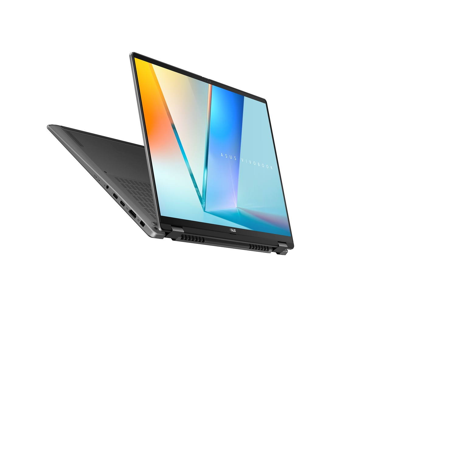 A gray Asus Vivobook laptop is open. The screen shows a colorful abstract image against a white background. The laptop is slightly angled.