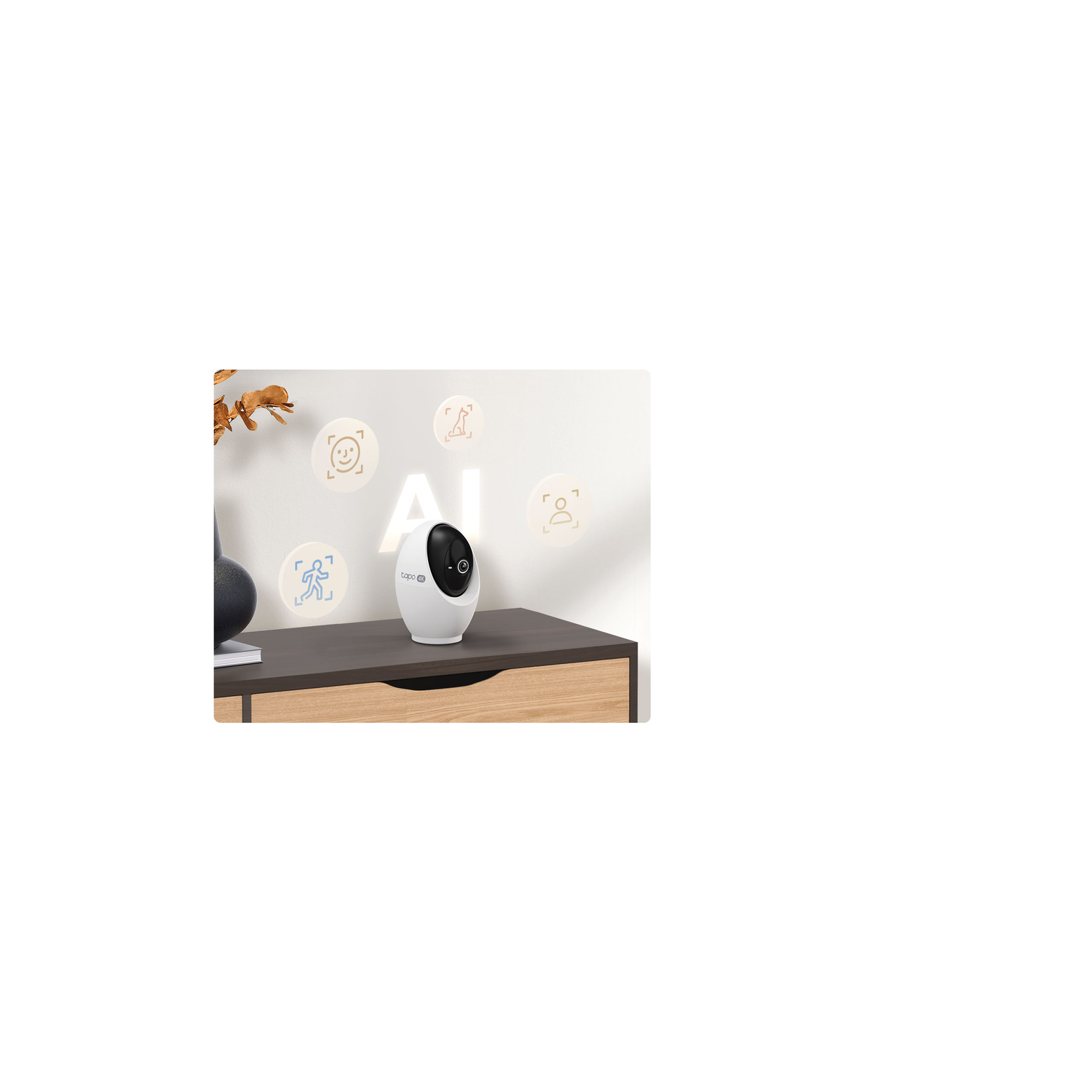 A white and black security camera sits on a brown table. The word AI is visible. There are icons of faces and people.
