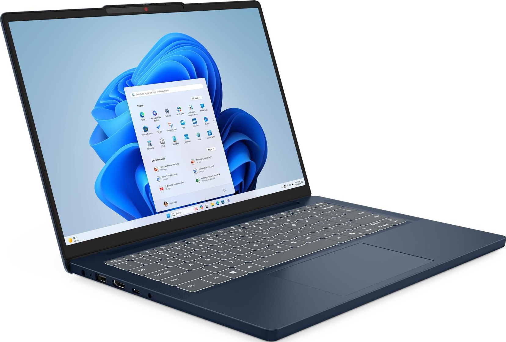 Blauer Laptop mit Windows 11. Der Bildschirm zeigt App-Symbole und ein Startmenü. Die Tastatur ist sichtbar.