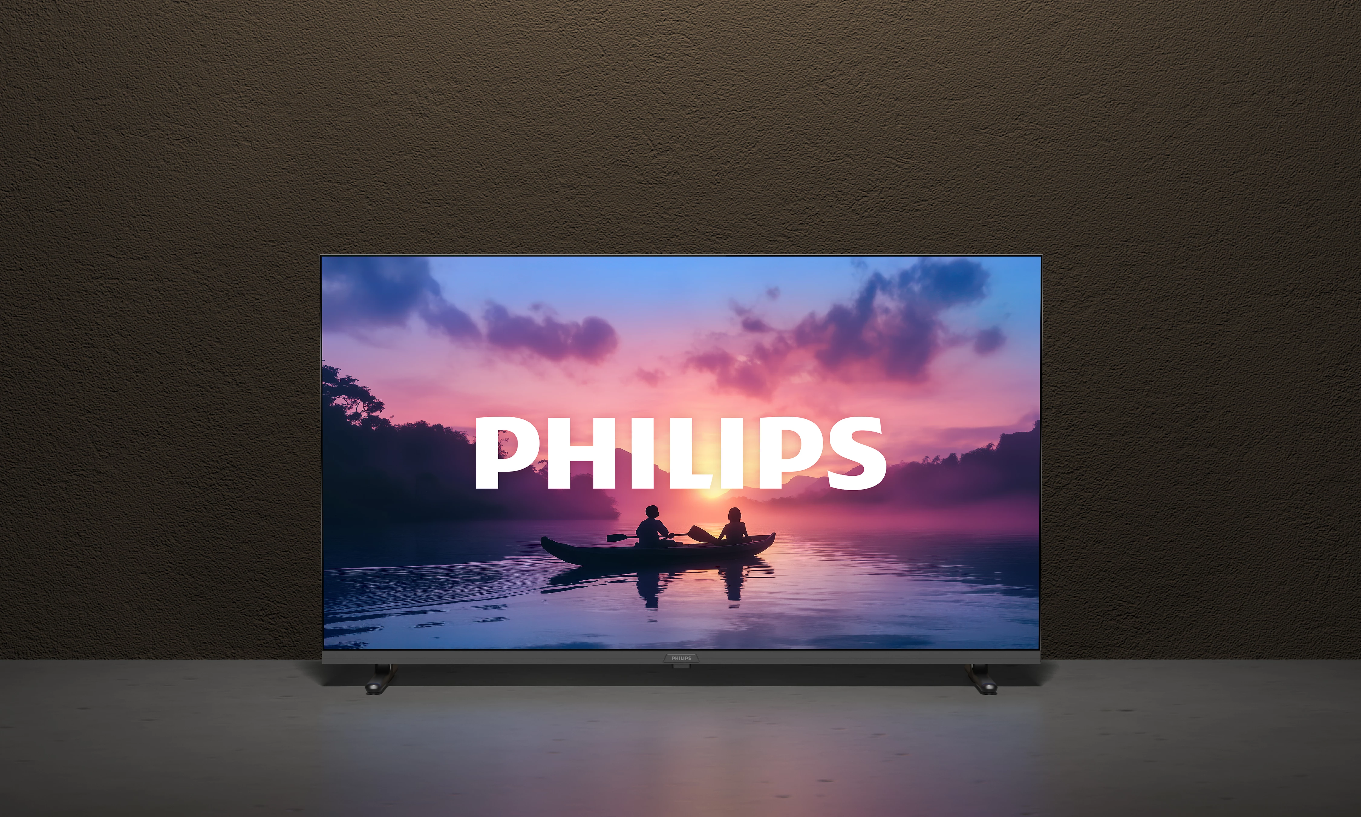 Ein Philips-Fernseher zeigt einen Sonnenuntergang über einem See mit Menschen in einem Boot. Das Wort 'PHILIPS' ist auf dem Bildschirm zu sehen.