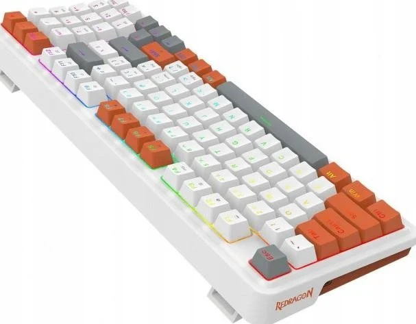 Biało-pomarańczowa klawiatura mechaniczna. Klawisze są białe, szare i pomarańczowe. Klawiatura ma białą ramę i czarne logo.